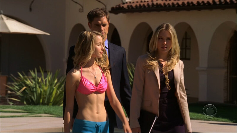 three people walking outside