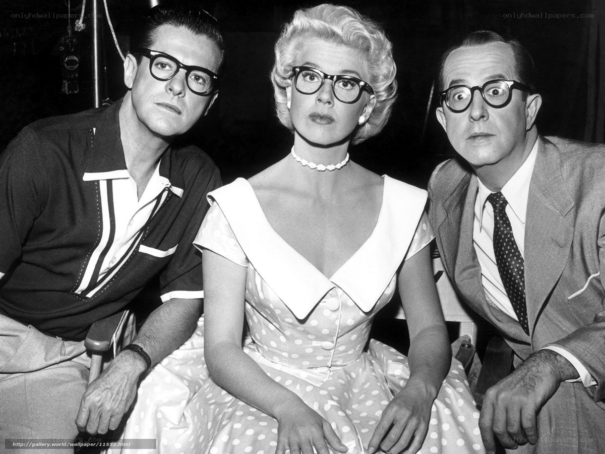 Three people wearing glasses
