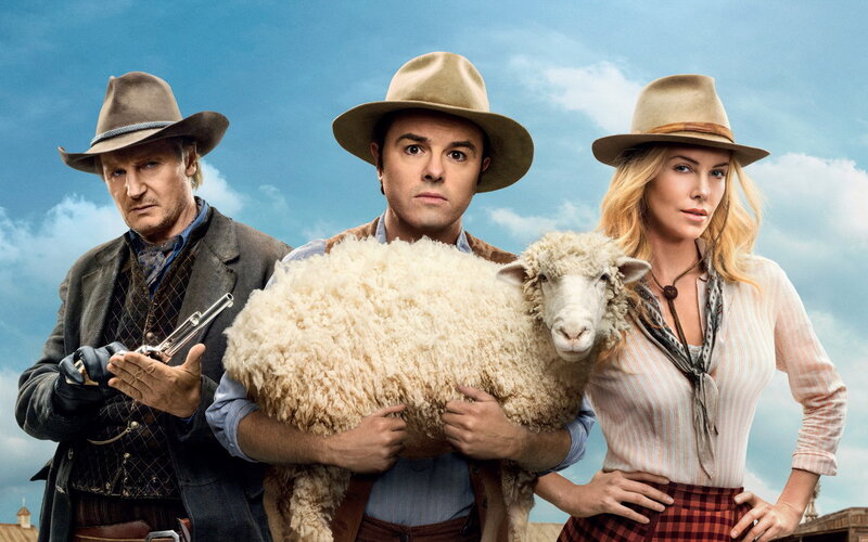 Three people with a sheep