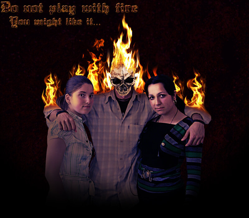 Three people with flaming skull