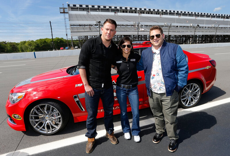 Three People with Red Car — Outdoor