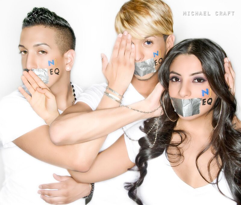 Three people with tape over mouths