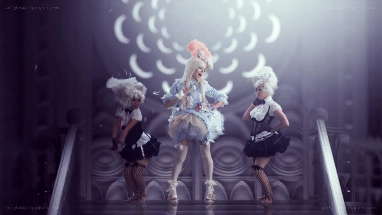 three performers on stage