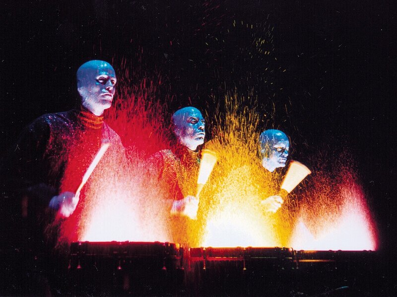 Three Performers with Blue Faces
