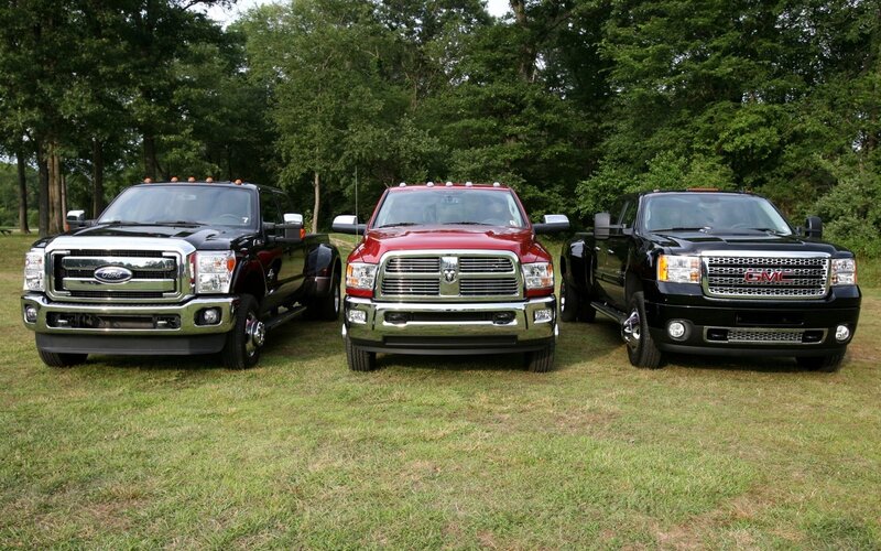 Three Pickup Trucks — Black