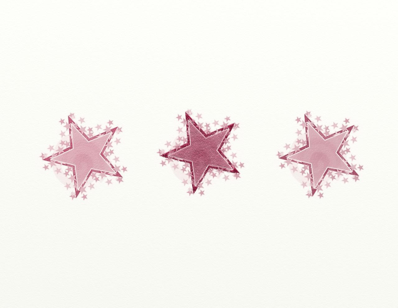three pink stars with sparkles