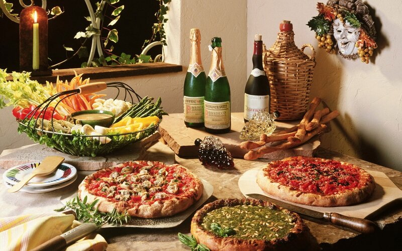 Three Pizzas on Table — Brown, Warm