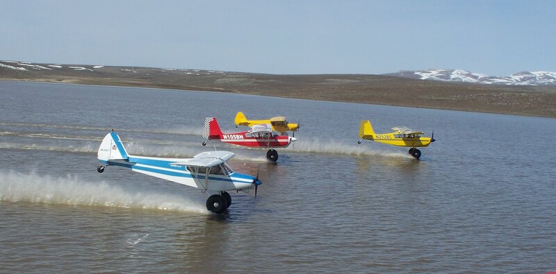 Three planes on water
