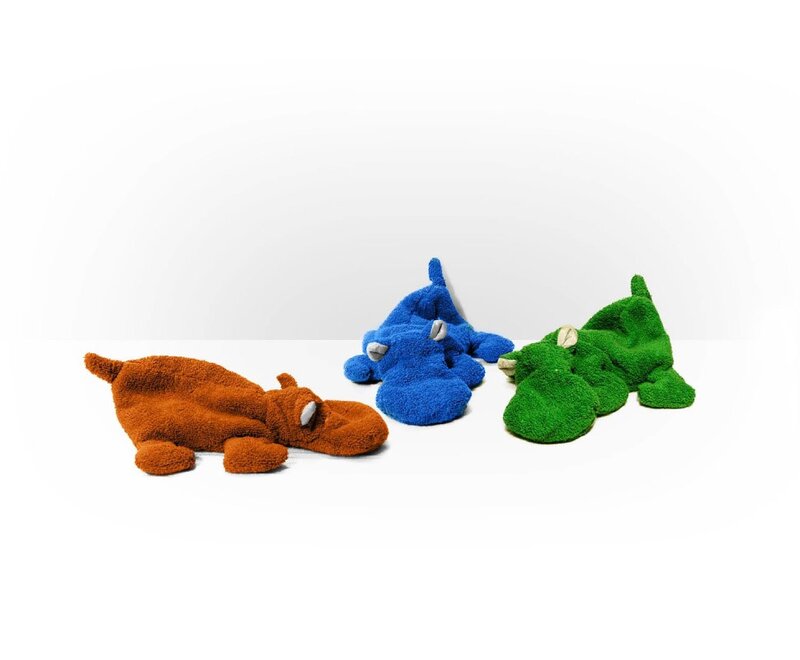 Three plush dinosaur toys