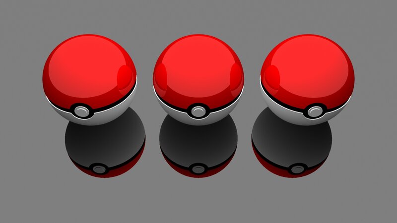 three pokeballs on reflective surface