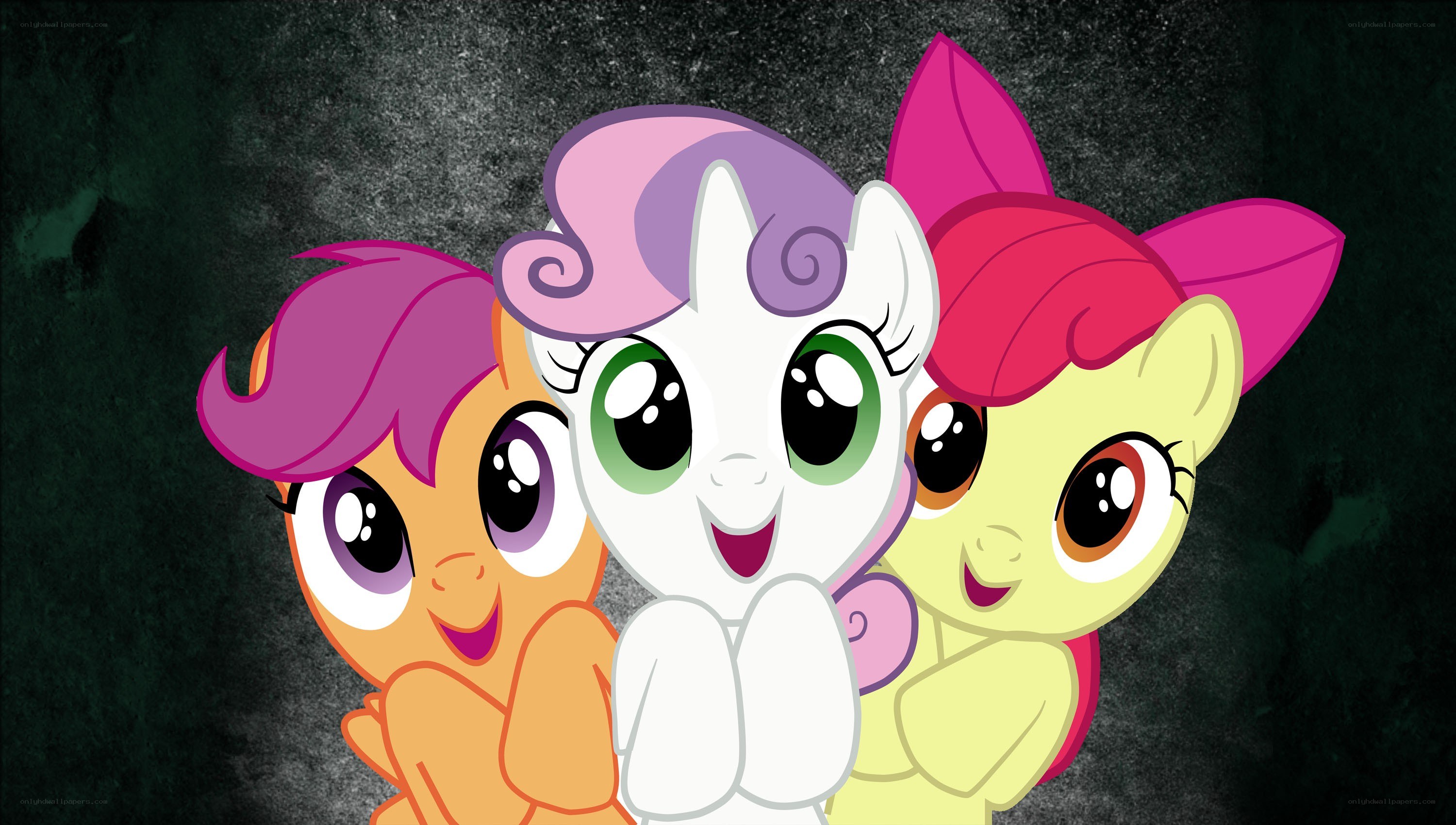 three ponies smiling together