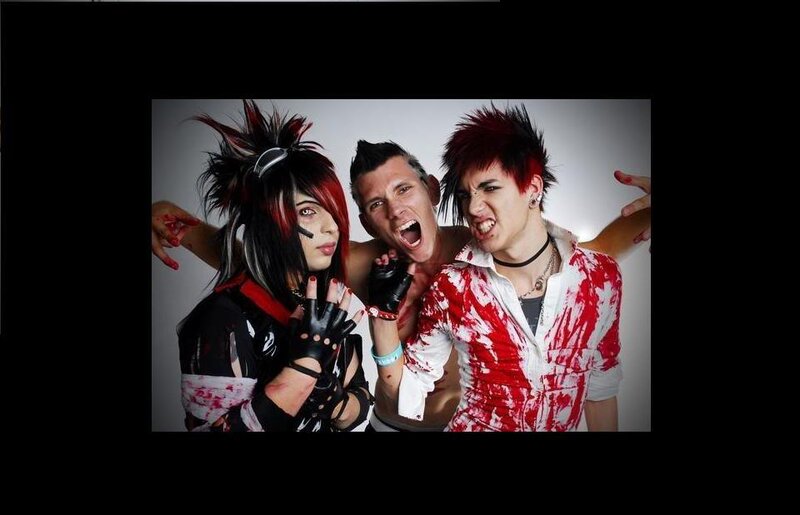 three punk rockers with blood effects