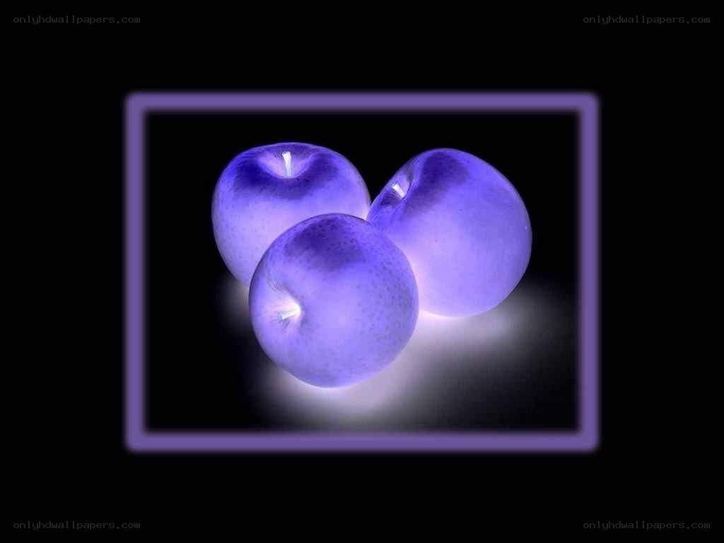three purple apples in frame