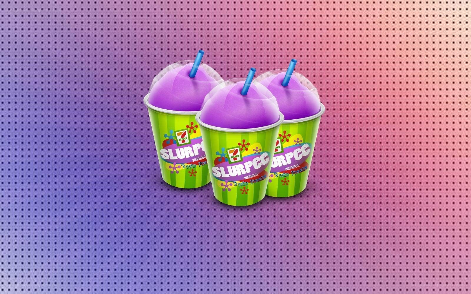 Three purple slurpees in cups