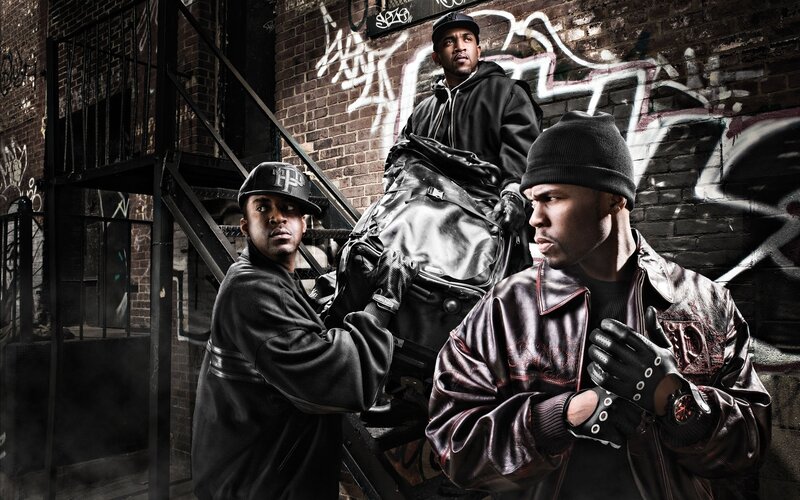 three rappers on a fire escape