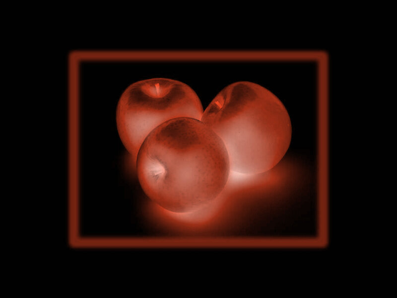 three red apples in a frame