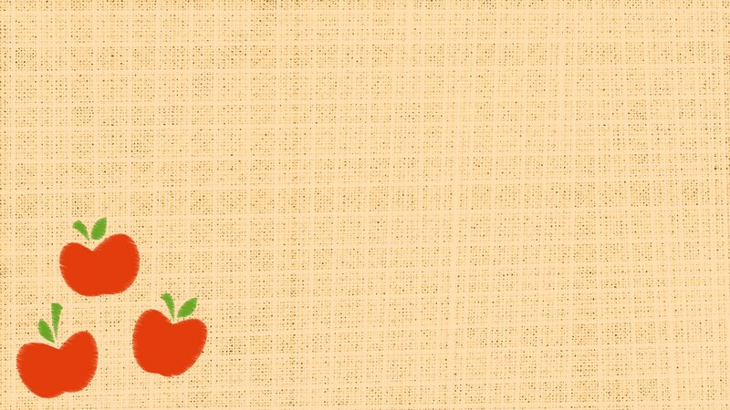 three red apples on burlap