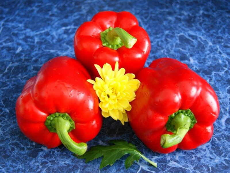 Three Red Bell Peppers