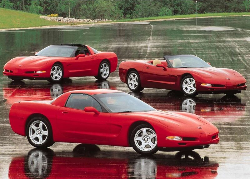 Three Red Corvette Cars