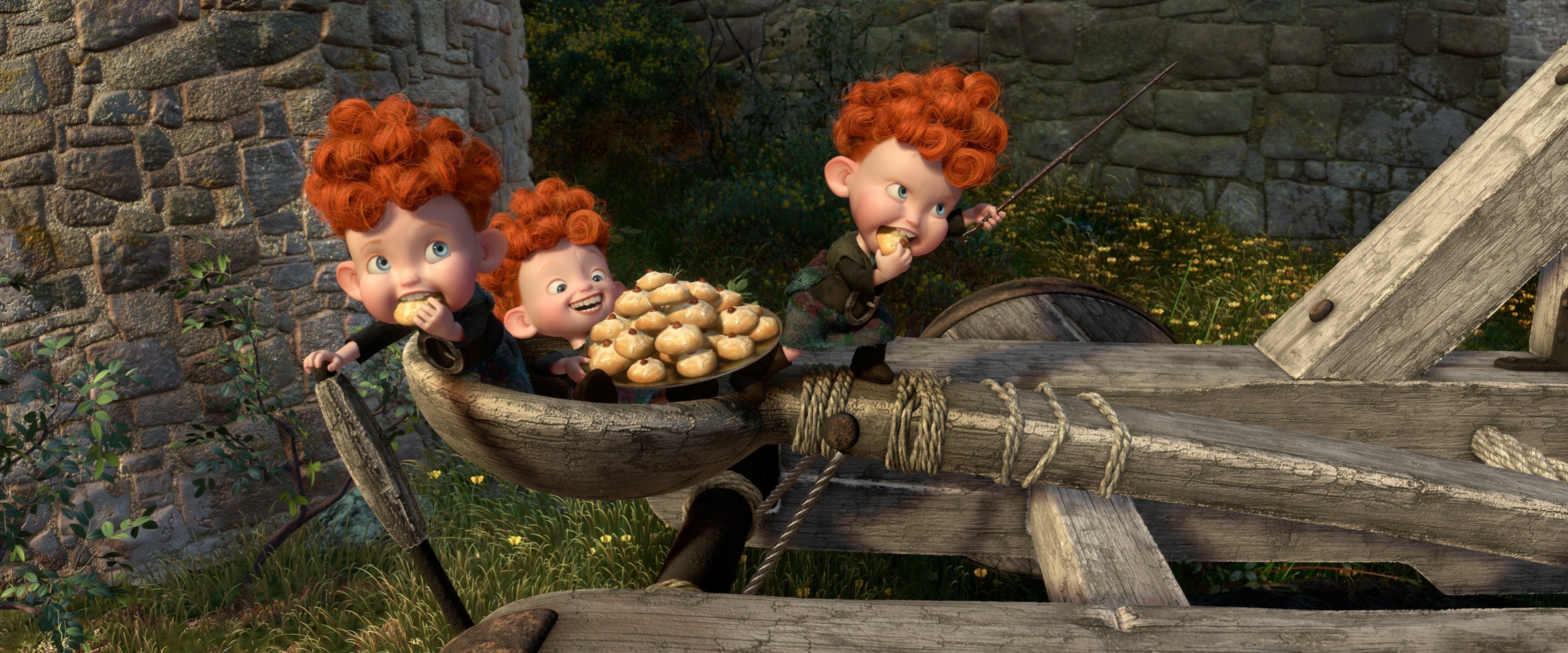 Three red-haired boys eating pastries