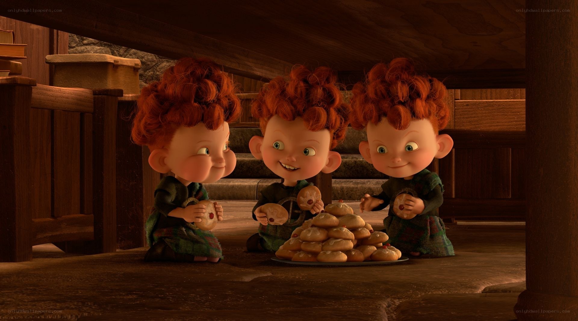 three red-haired children with cookies