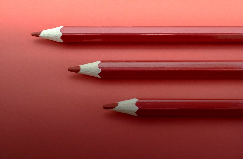 Three Red Pencils