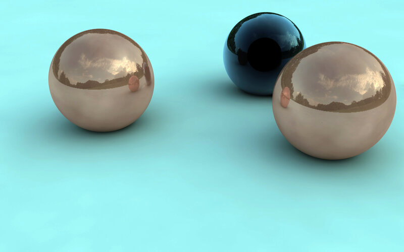 Three reflective spheres on a blue surface