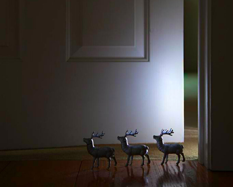 Three Reindeer Figurines