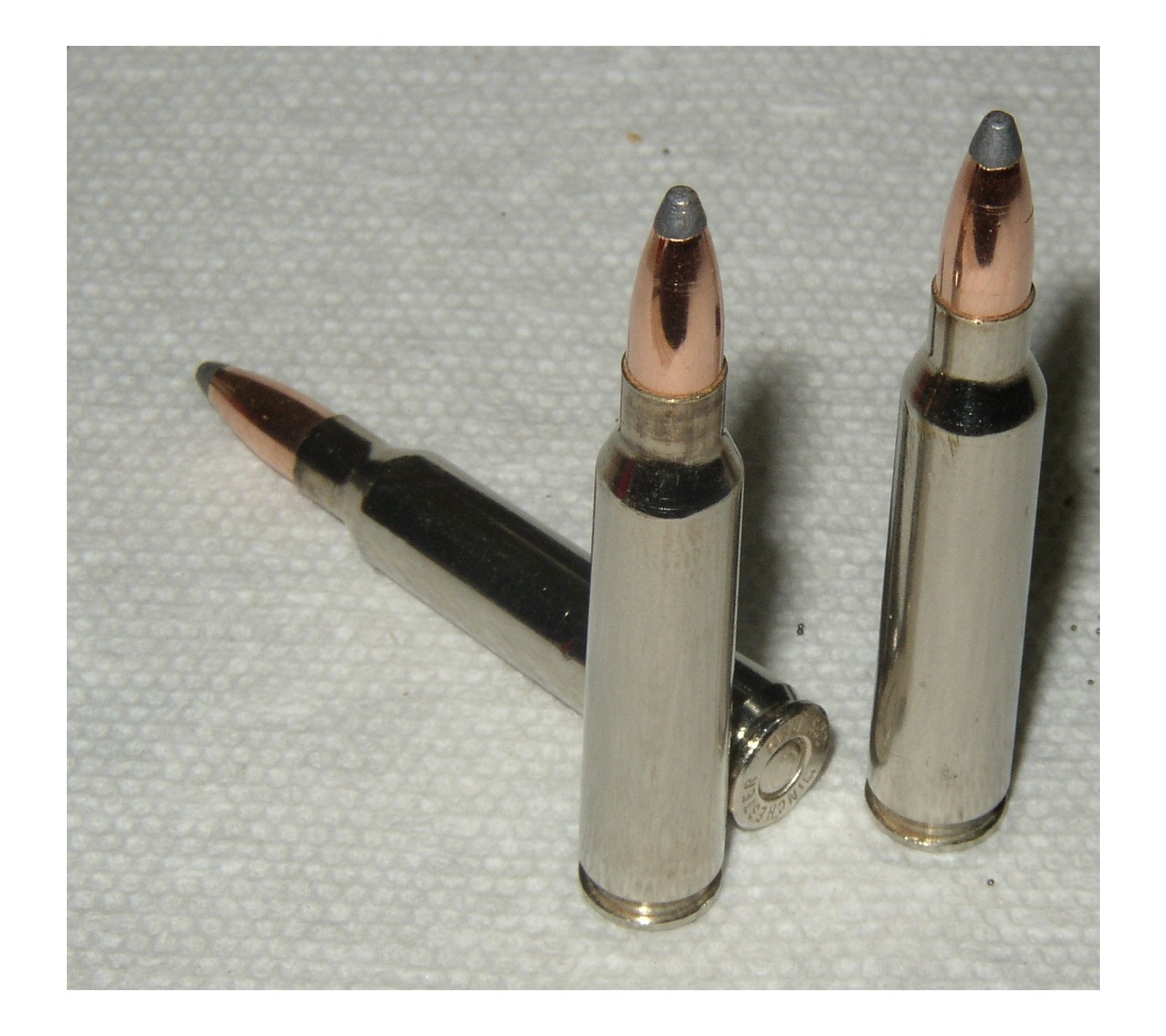 three rifle cartridges