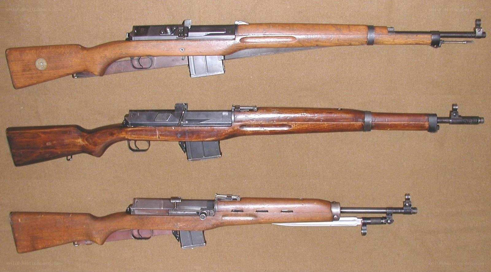Three rifles in a row