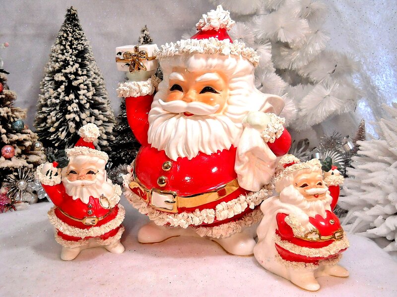 Three Santa Claus Figurines