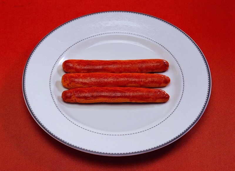 three sausages on a plate