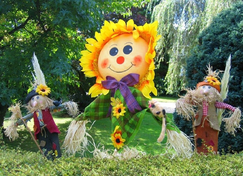 Three Scarecrows in Garden