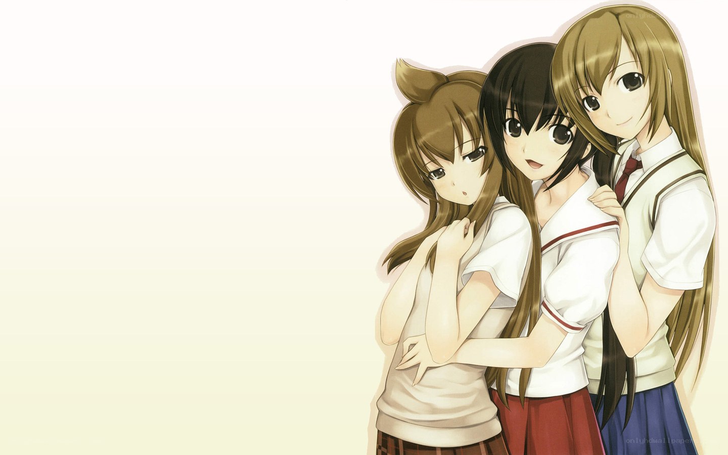 three schoolgirls hugging