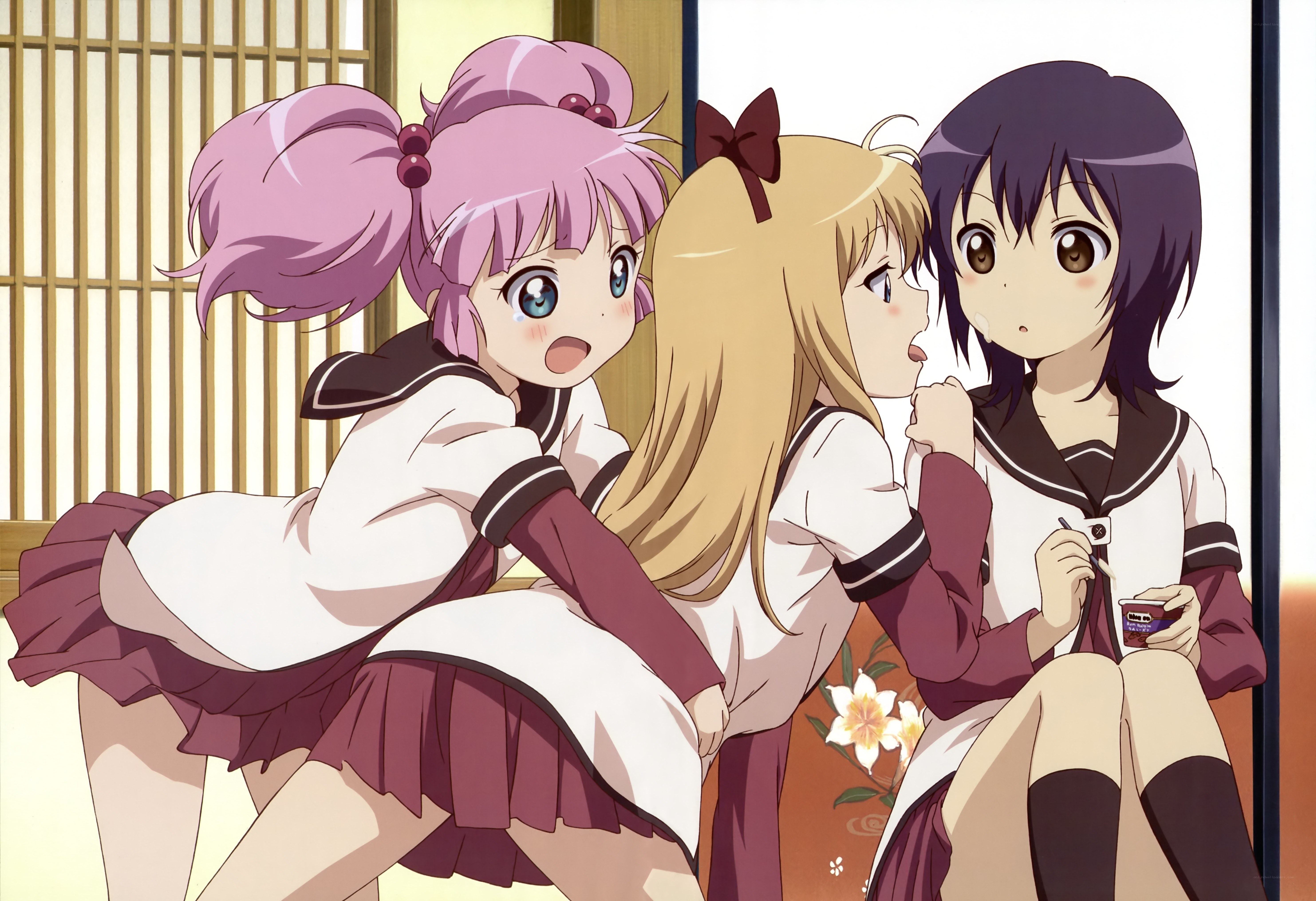 Three schoolgirls in a room