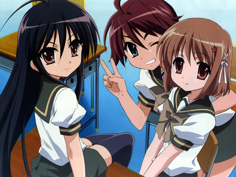 three schoolgirls in classroom