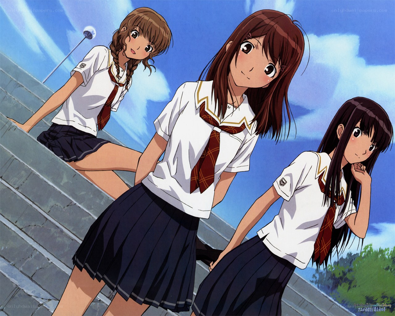 three schoolgirls on stairs