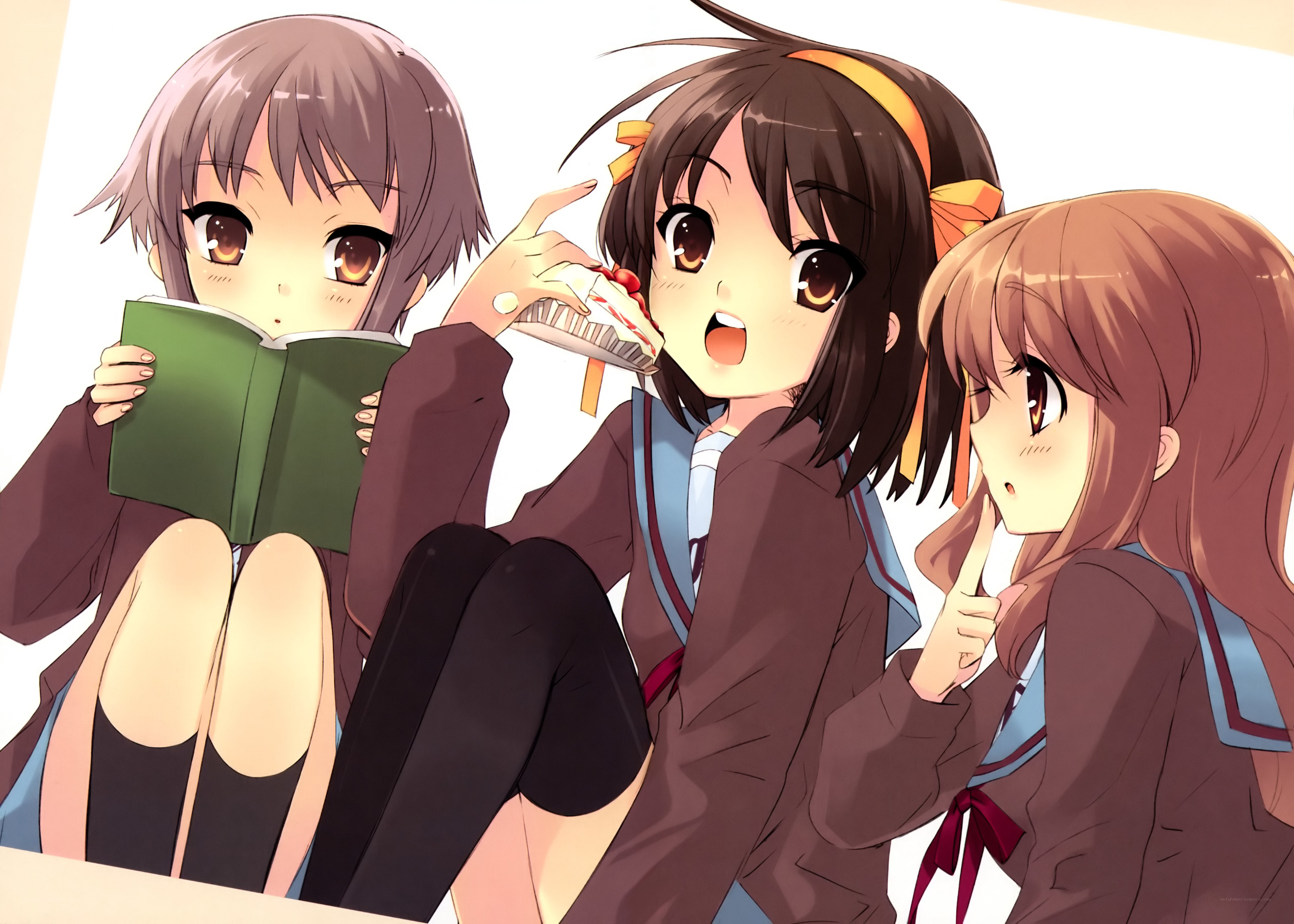 Three schoolgirls reading and eating