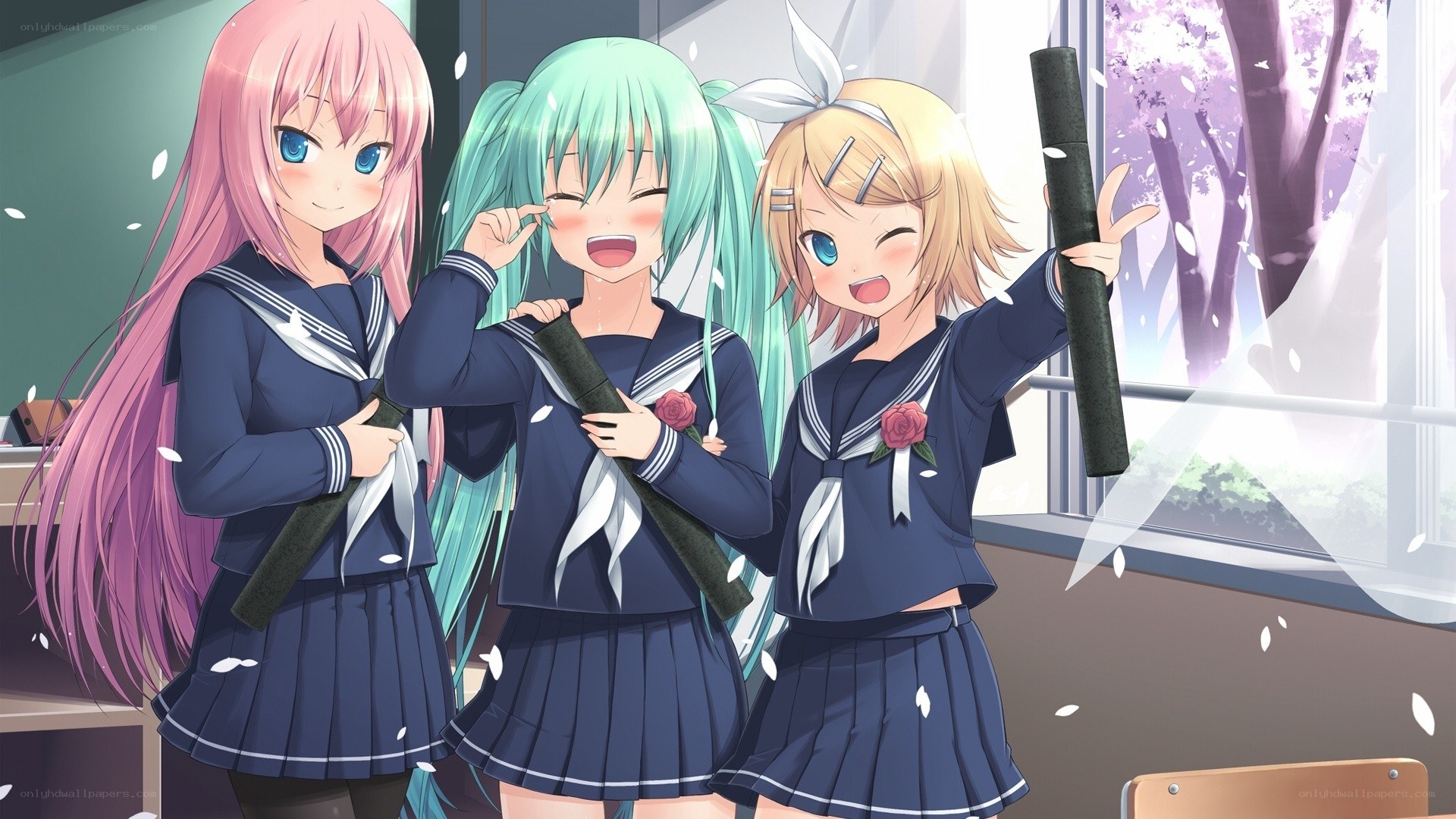 Three schoolgirls with bamboo swords