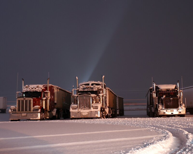 Three Semi-trucks in Snow