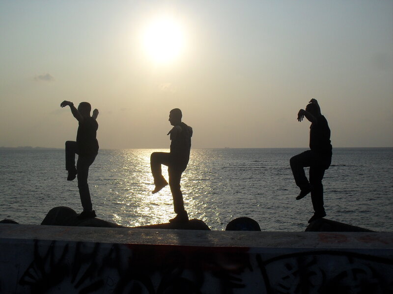 Three Silhouetted Dancers