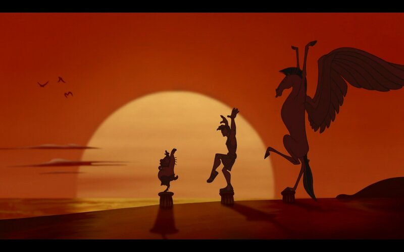 Three Silhouetted Figures — Orange
