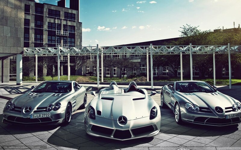 Three silver Mercedes-Benz sports cars