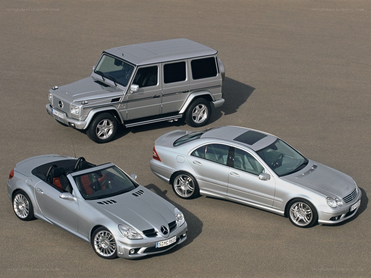 Three silver Mercedes-Benz vehicles