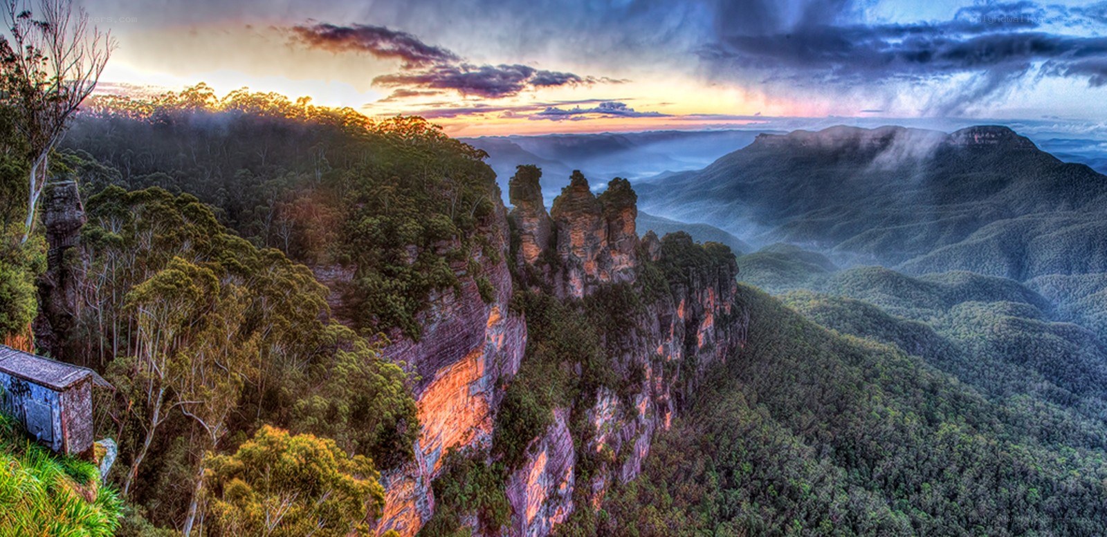 Three Sisters rock formation at sunset