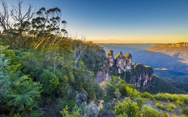 Three Sisters Rock Formation — Green, Serene, Sunrise