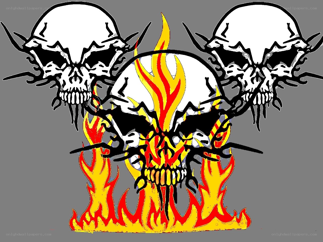 three skulls with flames