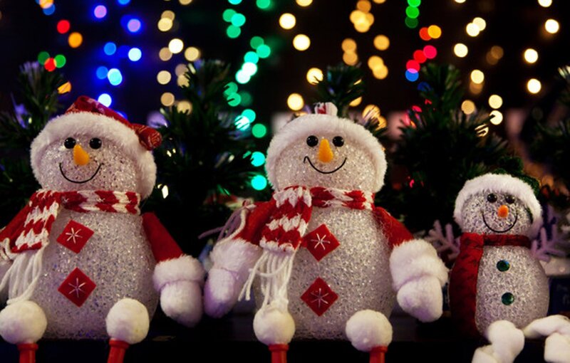 Three Snowman Figurines — White, Festive, Night