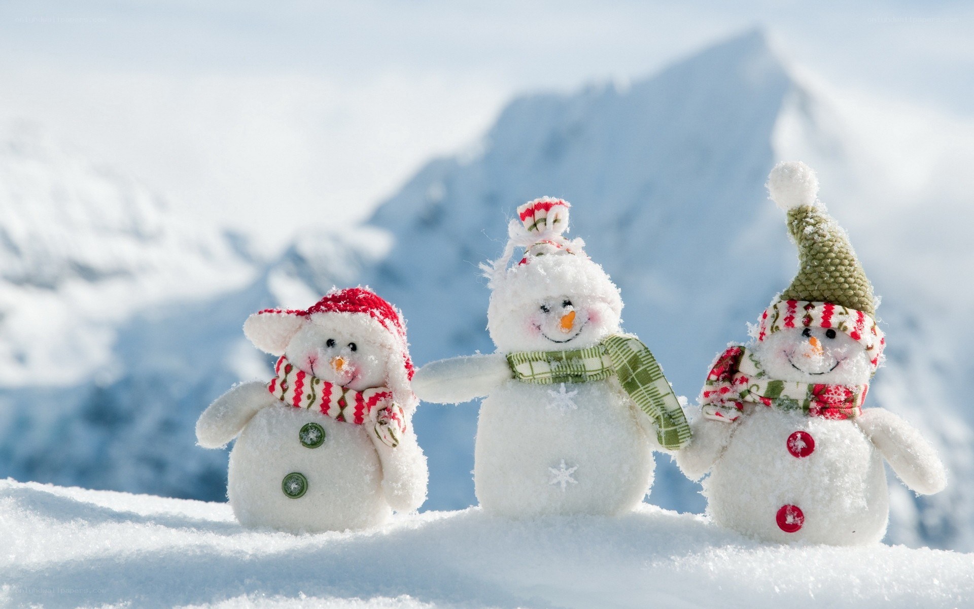 Three snowmen in the snow