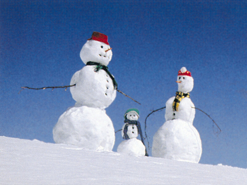 Three Snowmen on Hill
